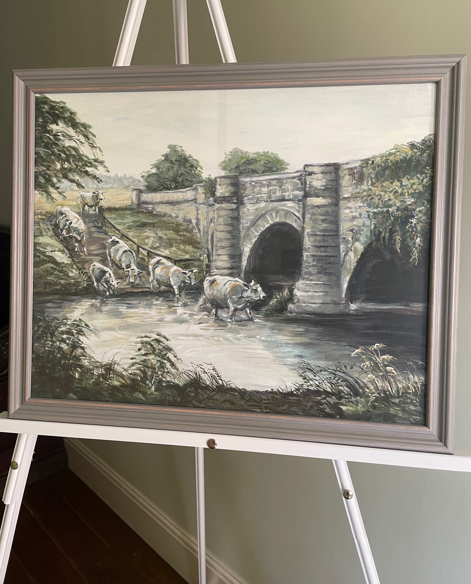 The bridge at Howsham This painting of cattle descending their bespoke ramp to cool off in the river.