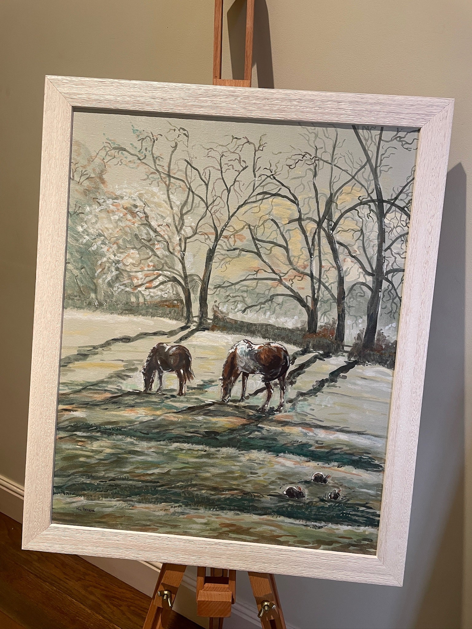 This painting features two hares in a heart shaped composition. These characterful hares have been spied before they leap across the countryside meadow.