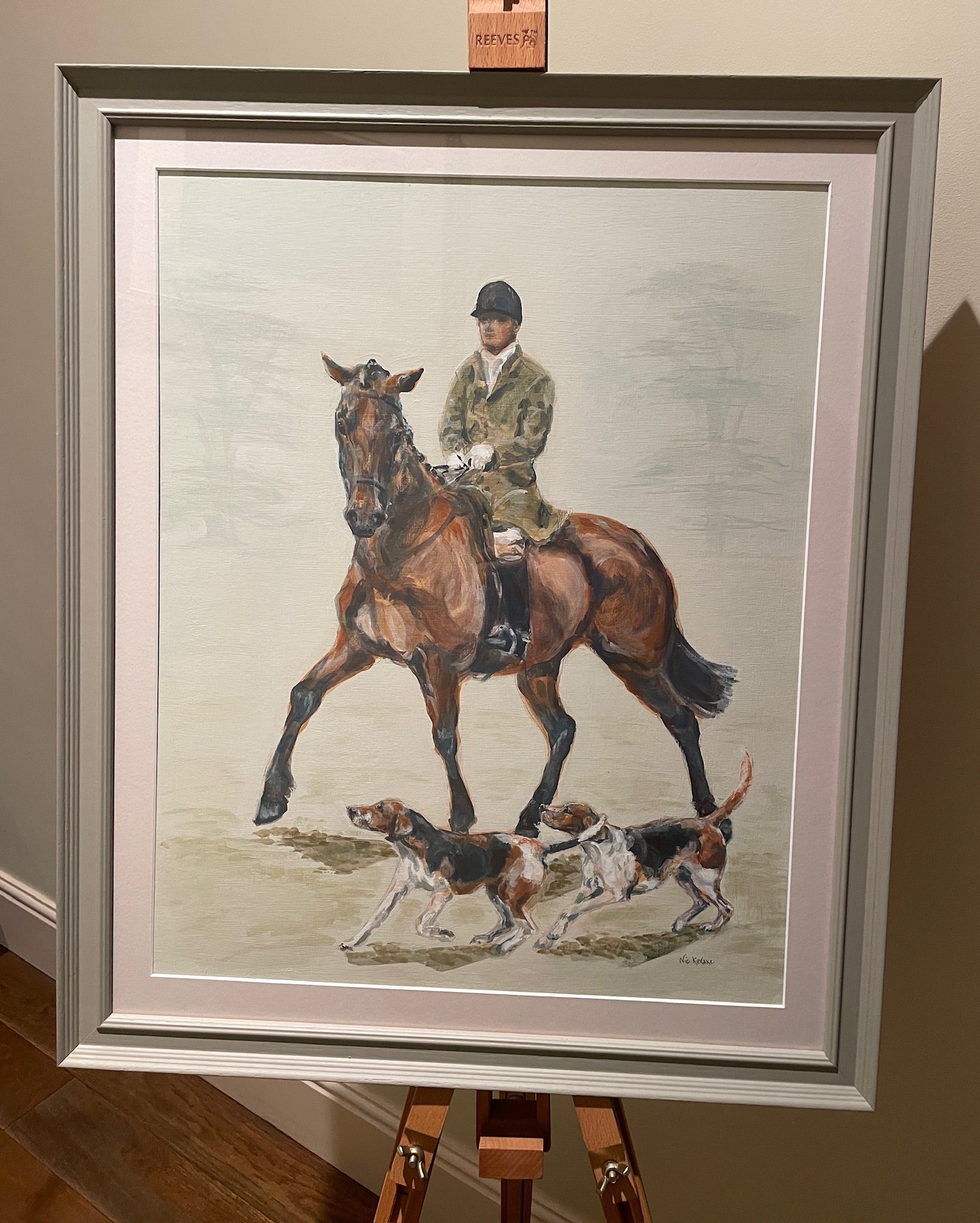 This painting captures a huntsman and hounds setting off from the hunt meet. The horse is shying at the two hounds who have rushed up to his side in fear of being left behind.