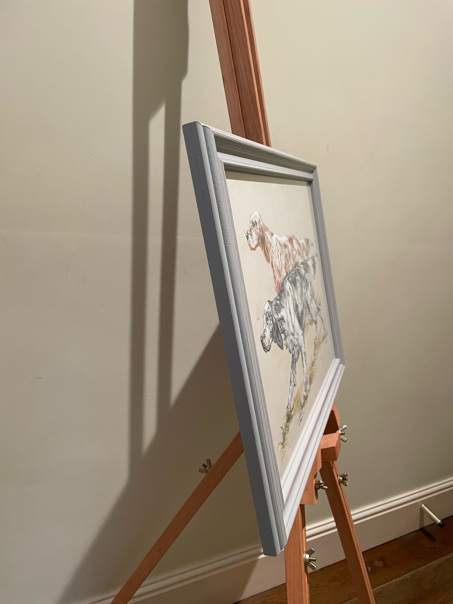 English Setters - two traditional gundogs hunting. A painting of a working dog breed inspired by old country sporting prints.