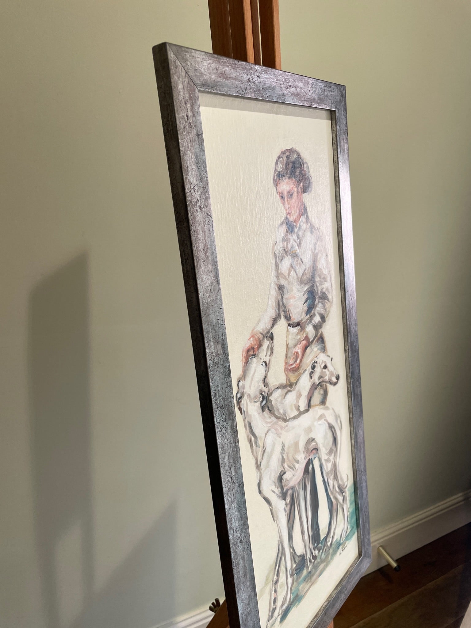 These paintings illustrate the timeless connection of people to their dogs. The elegance of gesture and devoted expression of the pale greyhounds is reminiscent of Art Deco decoration.