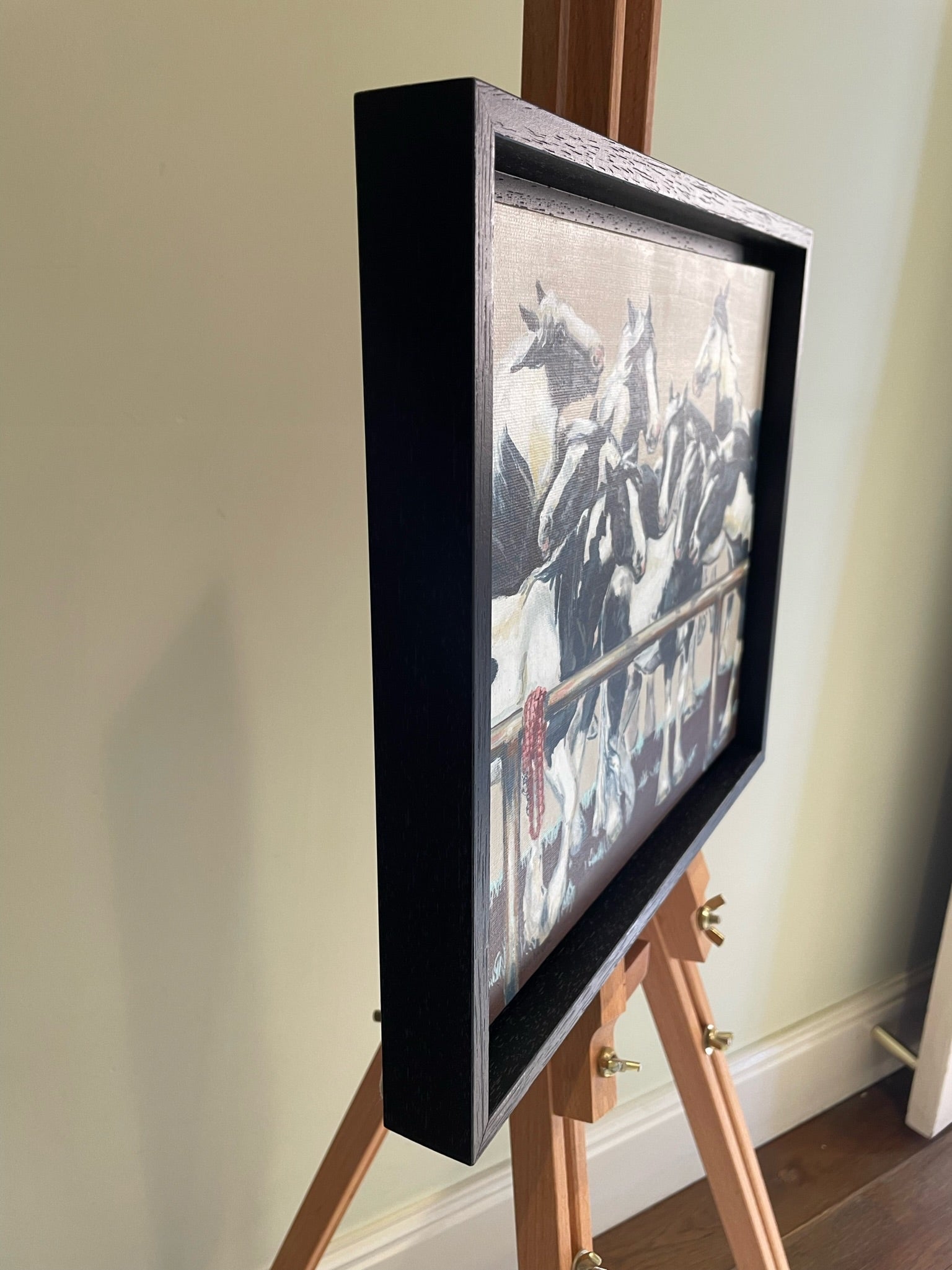 Piebald Ponies - A framed painting of black and white horses