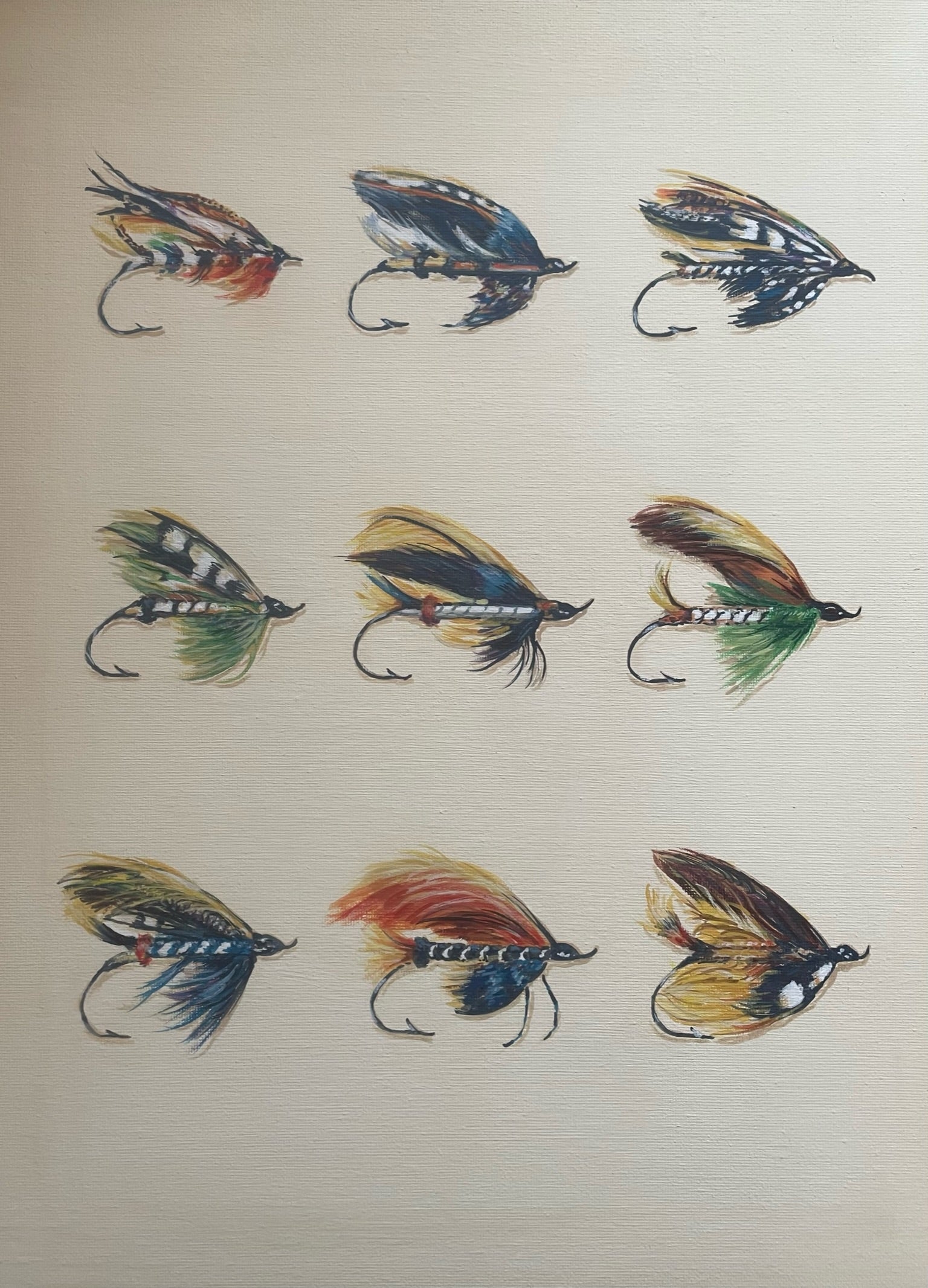 This painting is a homage to Megan Boyd 1915-2001, the celebrated fly tyer from the Scottish Highlands.  These fishing flies are like exotic insects or birds, they are so colourful, delicate and intricate in design.