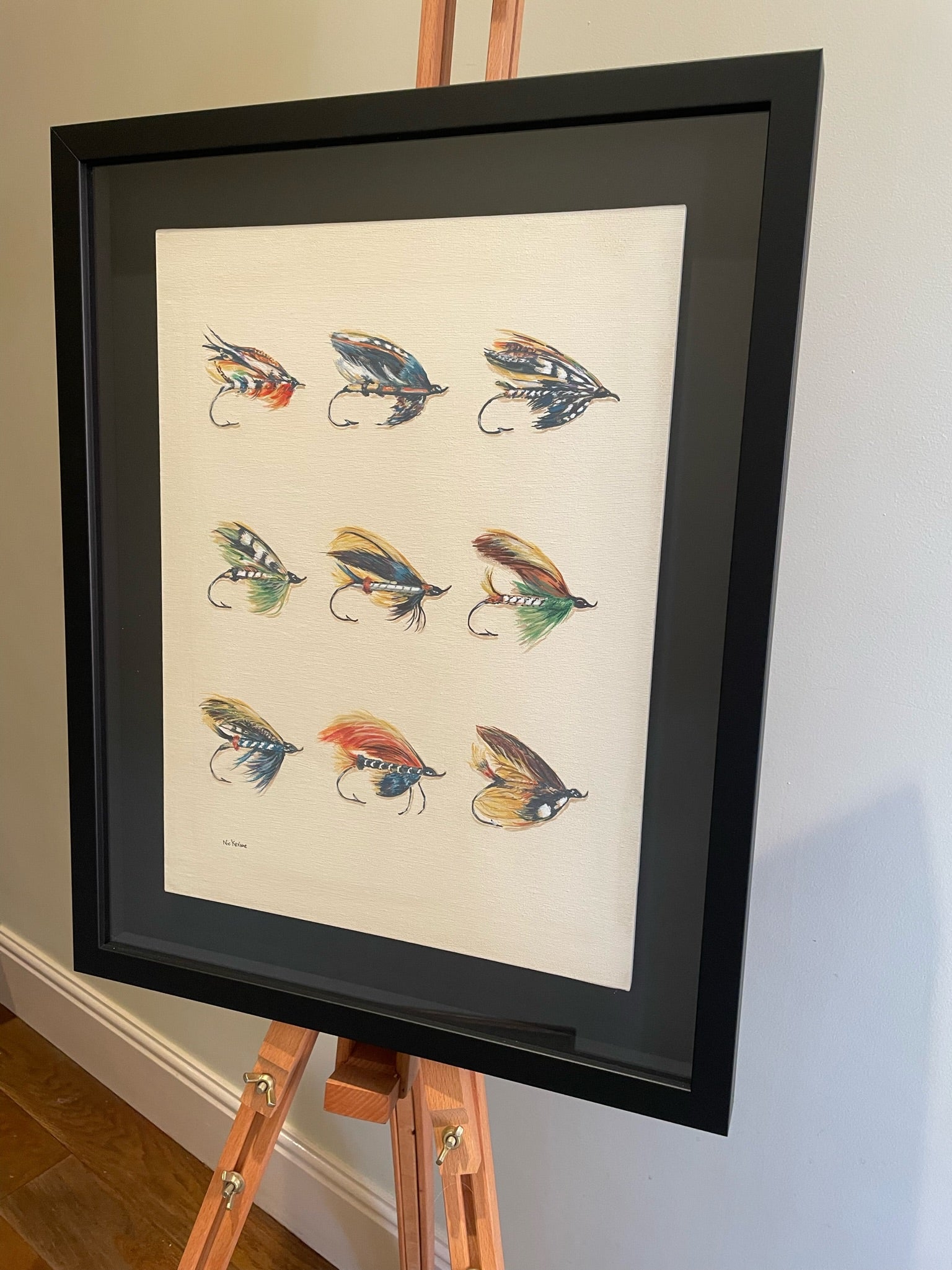 This painting is a homage to Megan Boyd 1915-2001, the celebrated fly tyer from the Scottish Highlands.  These fishing flies are like exotic insects or birds, they are so colourful, delicate and intricate in design.