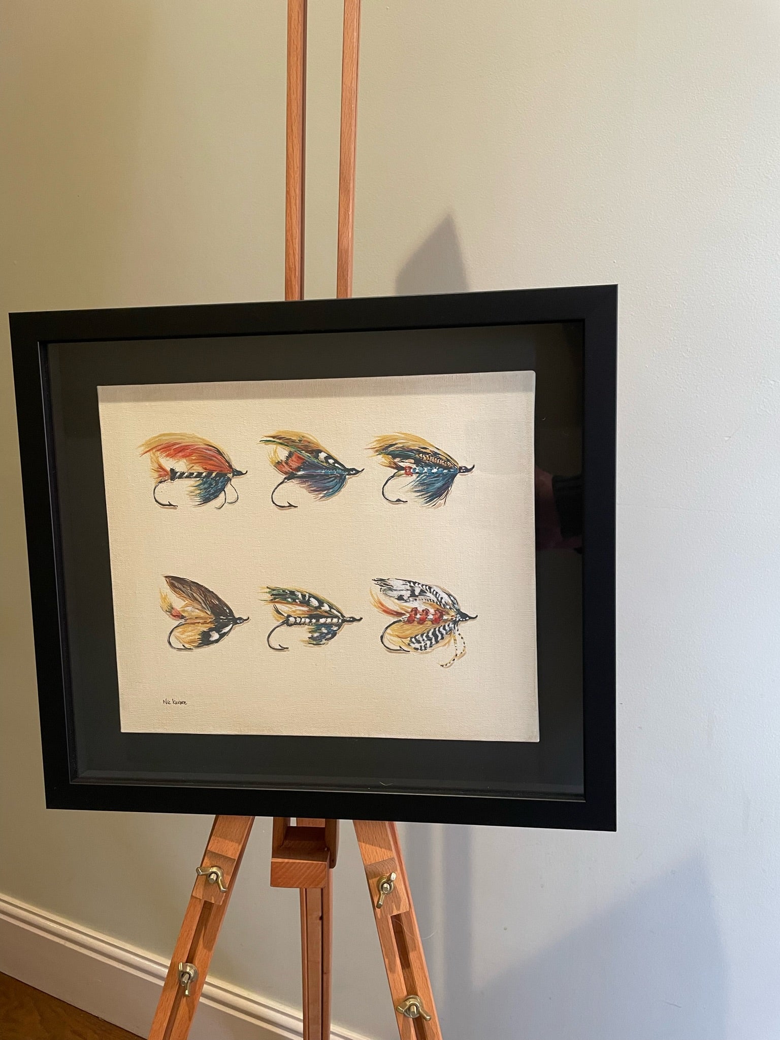 This painting is a homage to Megan Boyd 1915-2001, the celebrated fly tyer from the Scottish Highlands. These fishing flies are like exotic insects or birds, they are so colourful, delicate and intricate in design.