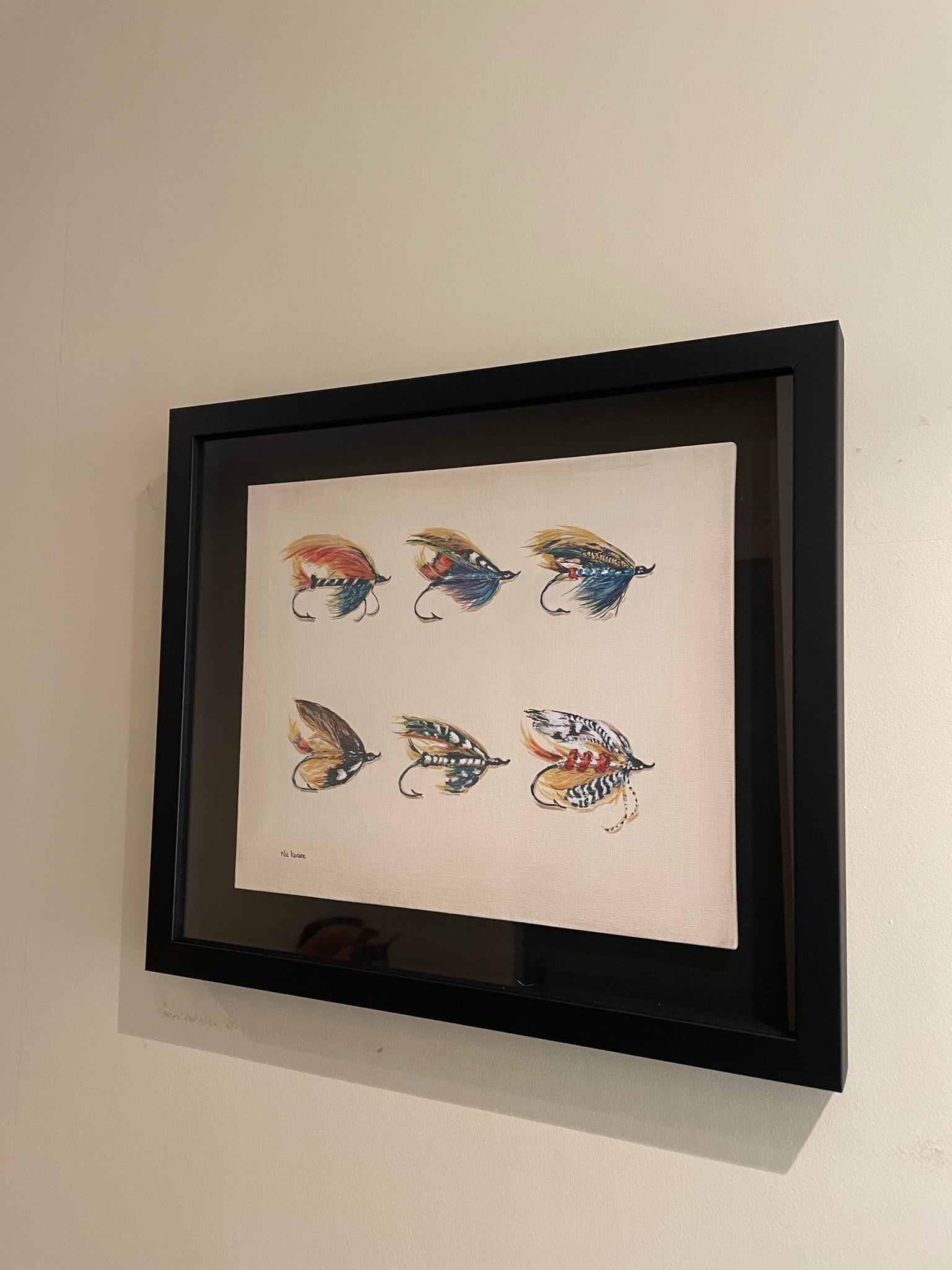 This painting is a homage to Megan Boyd 1915-2001, the celebrated fly tyer from the Scottish Highlands. These fishing flies are like exotic insects or birds, they are so colourful, delicate and intricate in design.