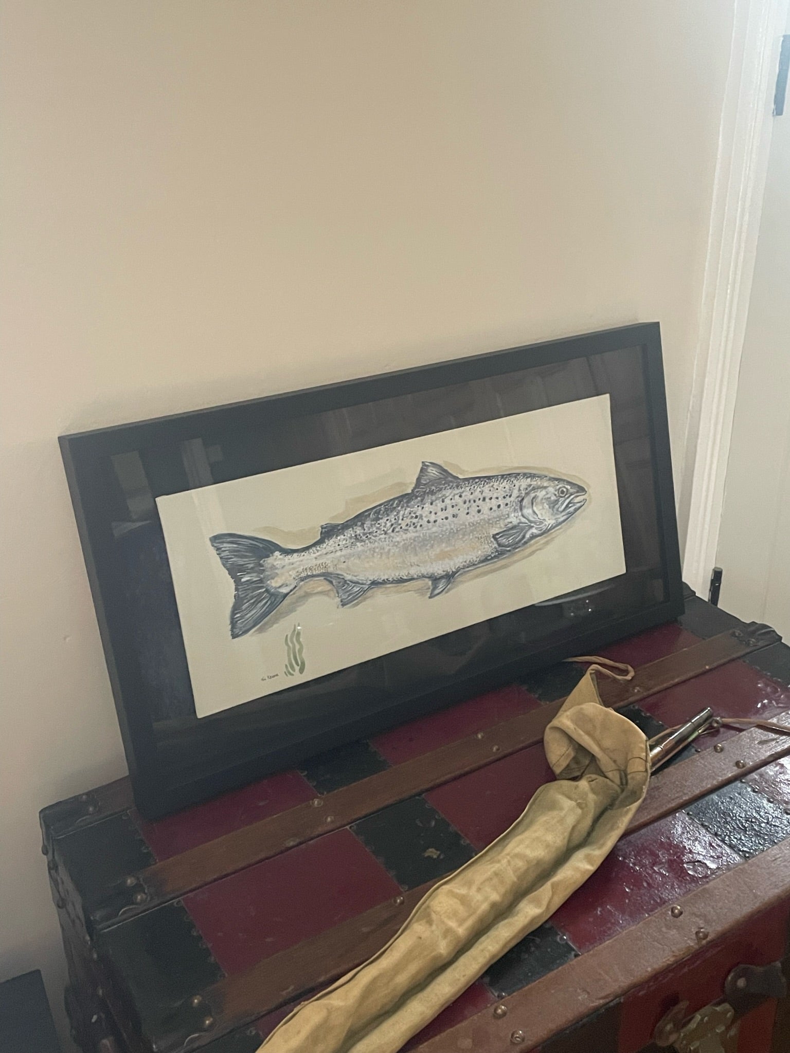 Salmon. This painting is reminiscent of the traditional taxidermy fish displayed in a glass fronted case, often seen in country houses and fieldsports lodges.