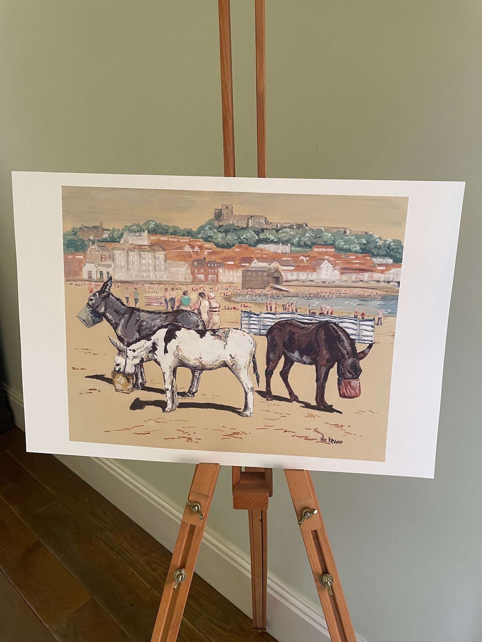 Lunchtime at Scarborough. This fine art giclee print is created from a painting of traditional seaside donkeys at Scarborough, North Yorkshire.