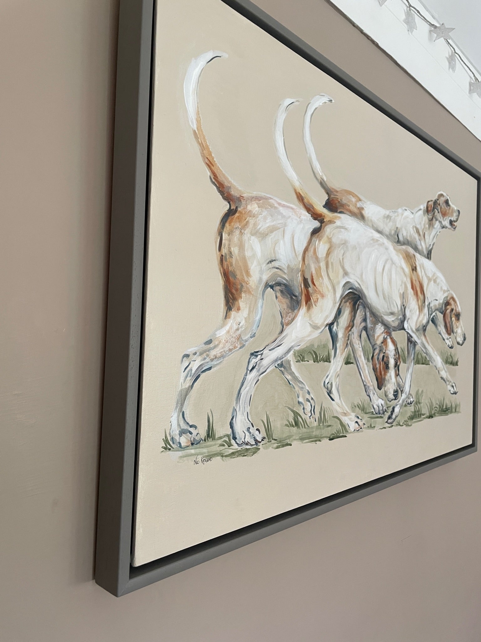 This painting shows three hounds ready to go hunting. These three each have their own characters. The background colour of the painting is a creamy beige.