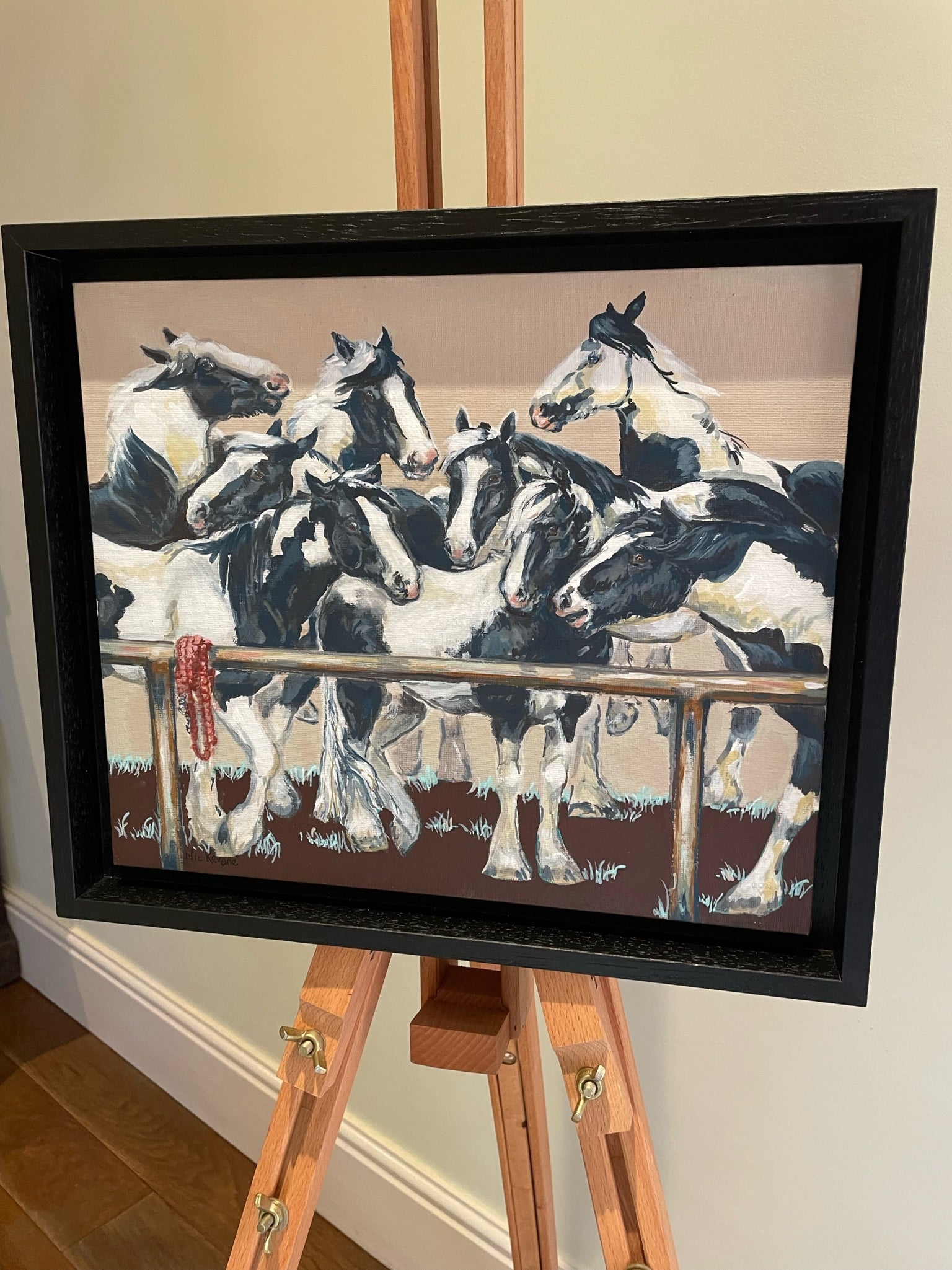 Piebald Ponies - A framed painting of black and white horses