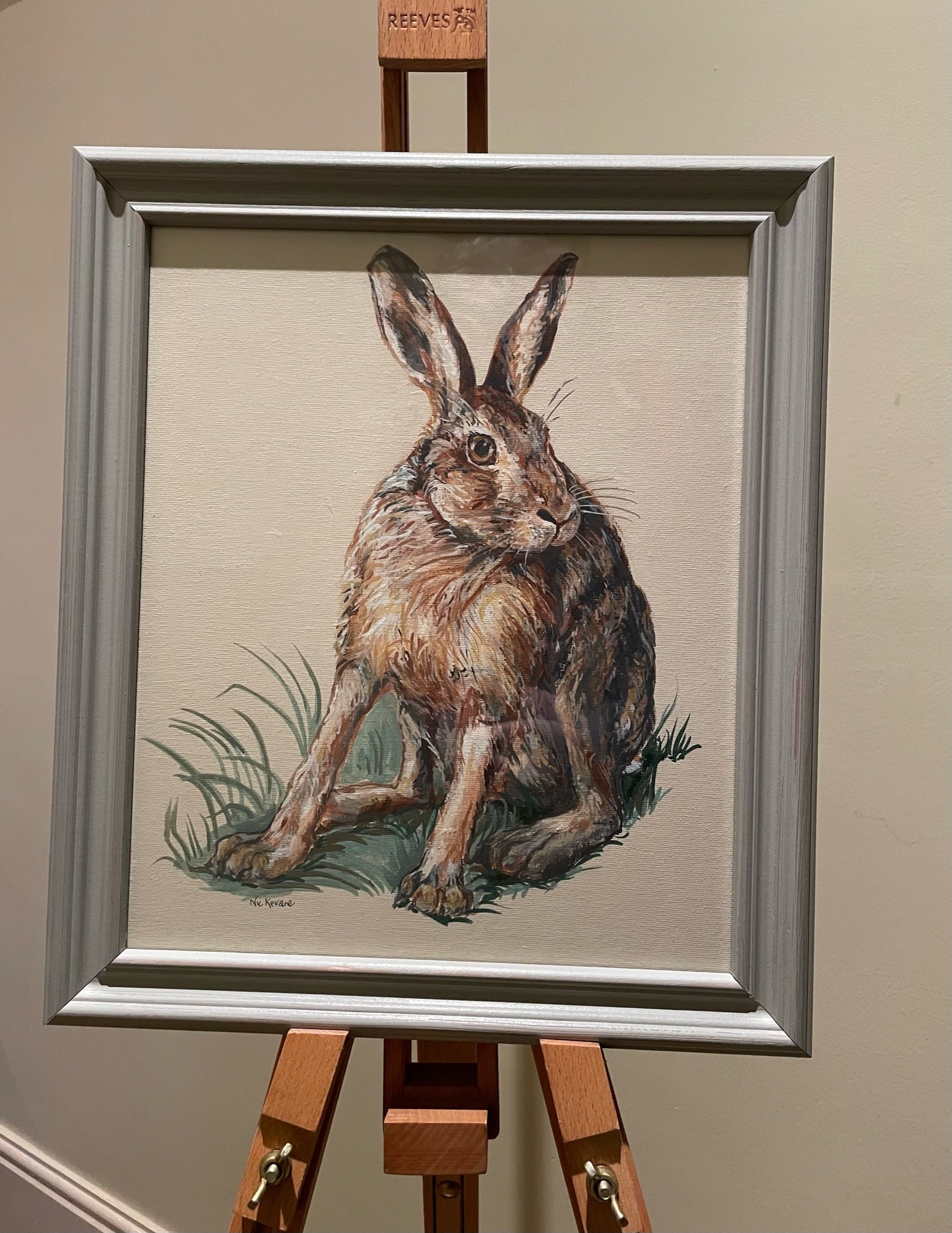 This painting is of a hare about to dash off after being discovered in the field.  The background colour of the painting is a soft off-white.