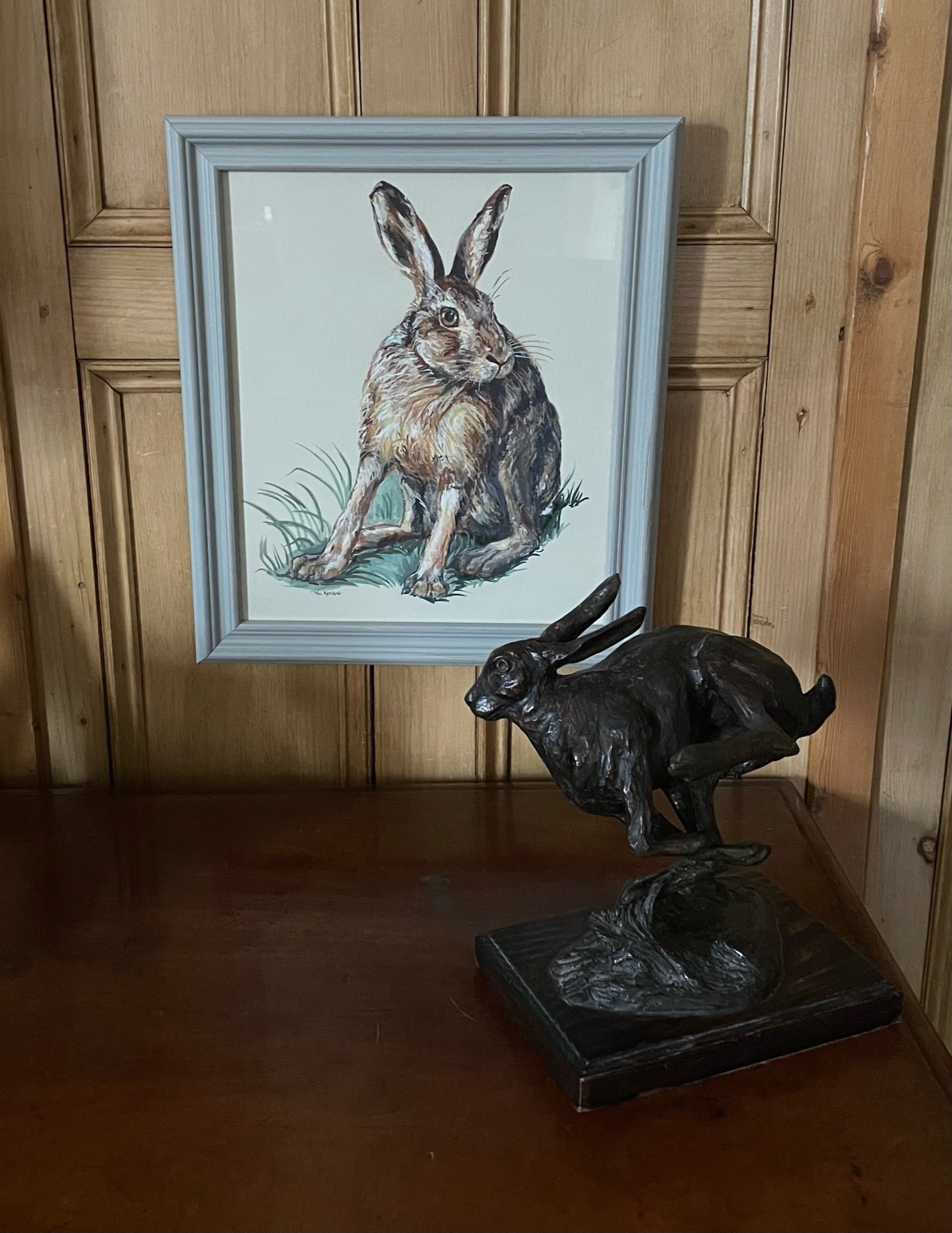 This painting is of a hare about to dash off after being discovered in the field.  The background colour of the painting is a soft off-white.